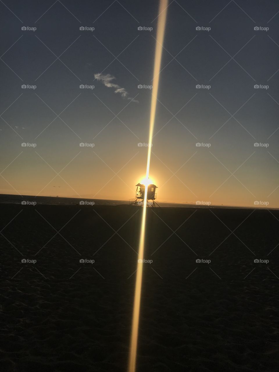Sunset over lifeguard tower 