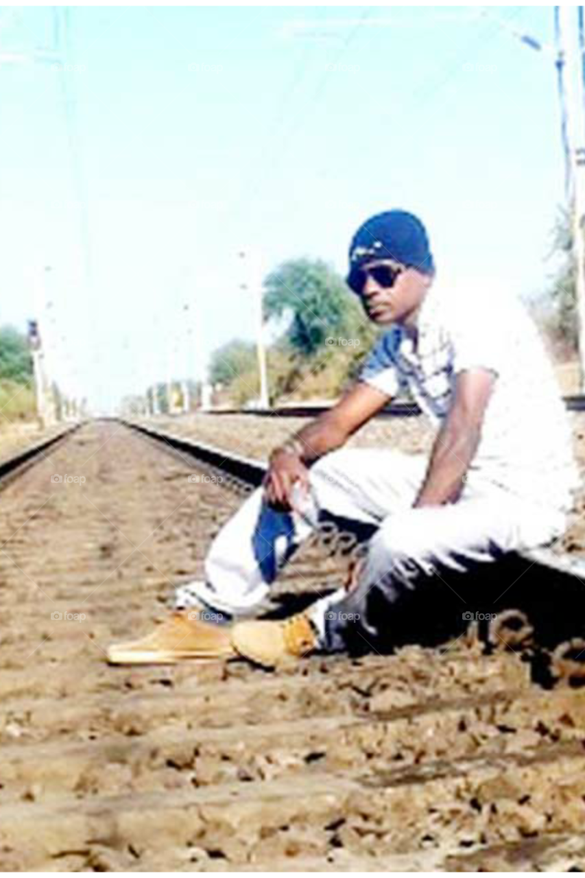 one boy photo/indian photo/one indian boy photo/model photo/one male model photo/good full photo/ruf and tuf photo/real style model photo/white t shirt photo/unique style photo of model/good photo of modeling /indian boy real style photo