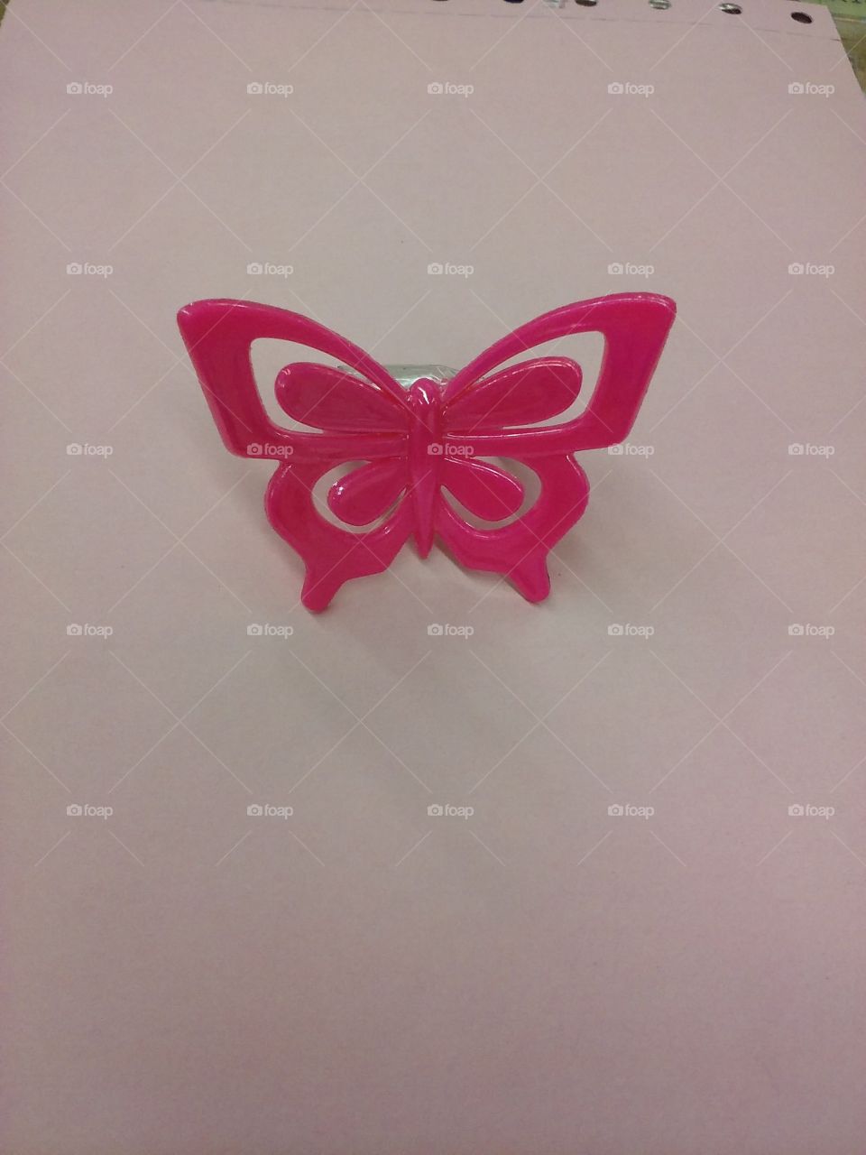 a pink plastic butterfly ring would light up a little girl's face!