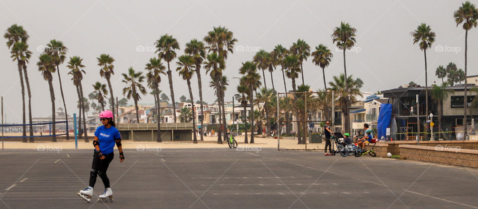 Inline skating at Newport Beach basketball courts 