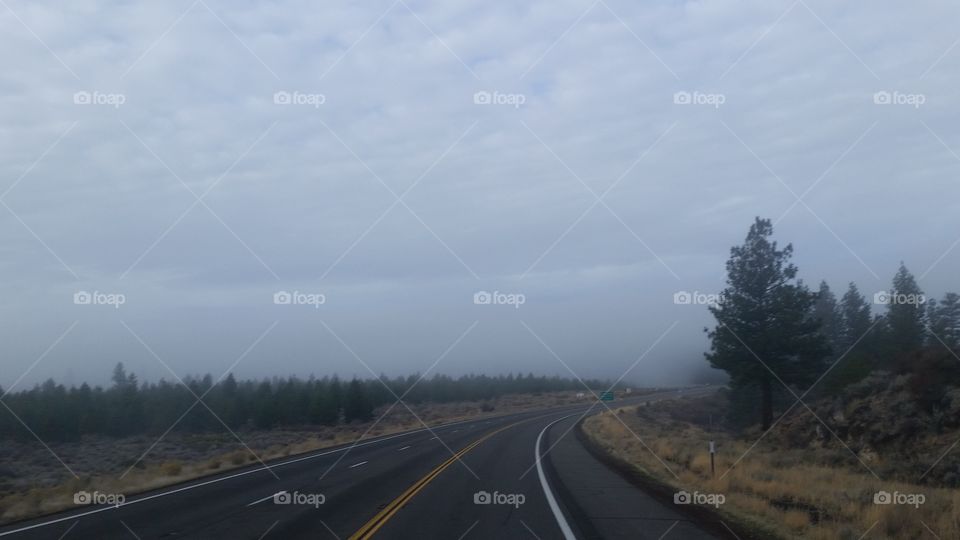 open roads with mysterious clouds