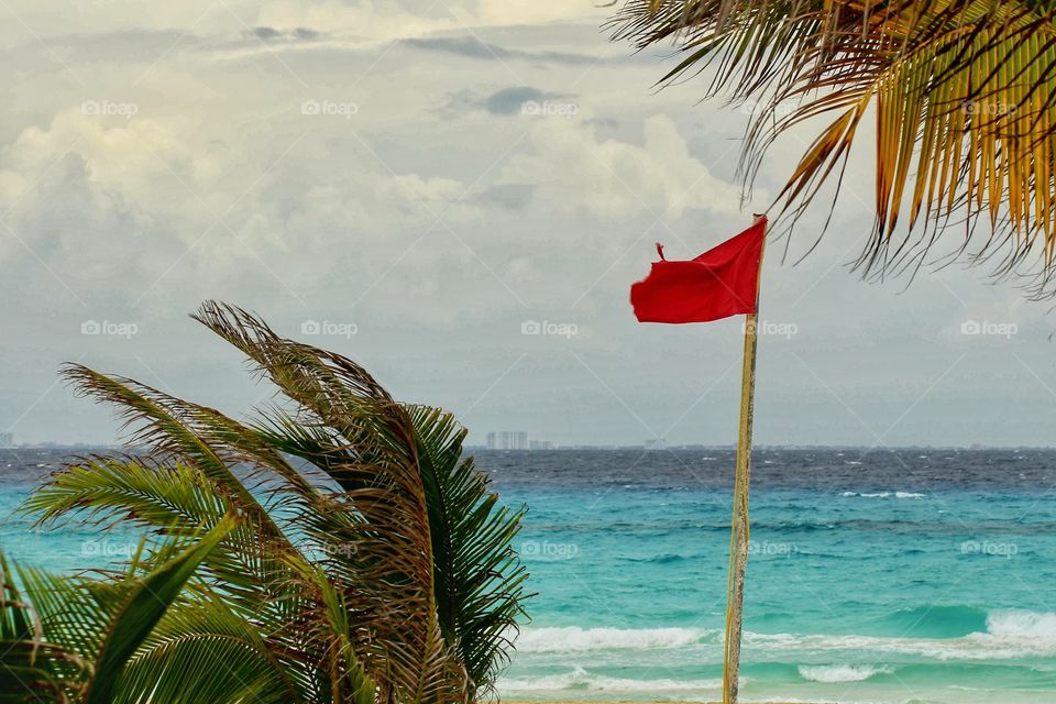 red flag on the caribbean sea