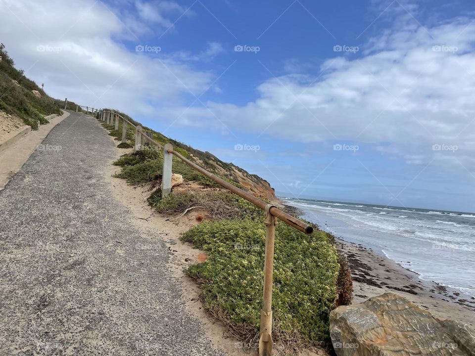 Rustic railing on beach in Australia 