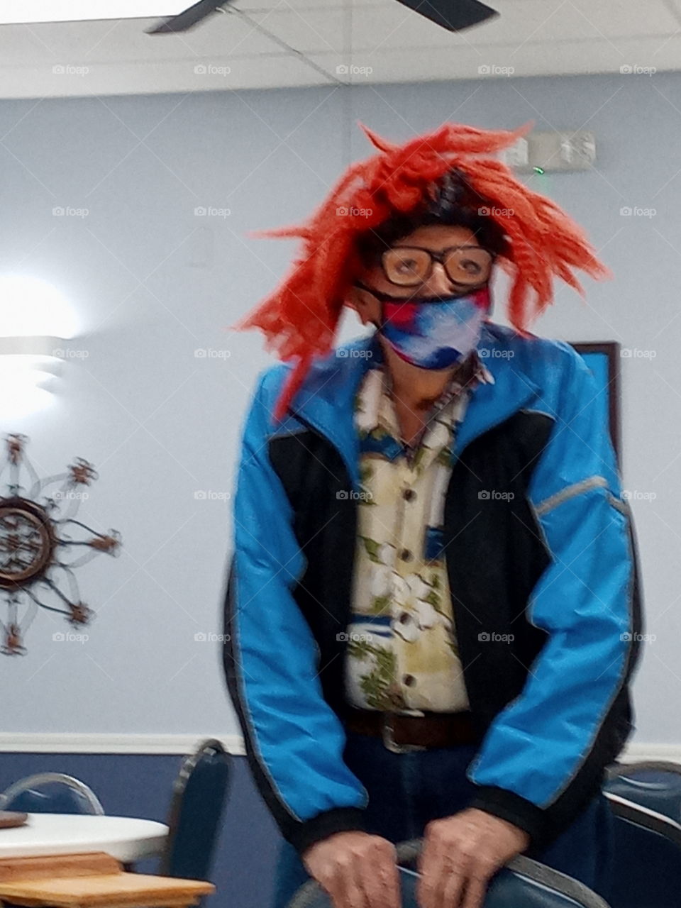 even the men are into dressing up for the event. I wonder who's going to win the best costume.