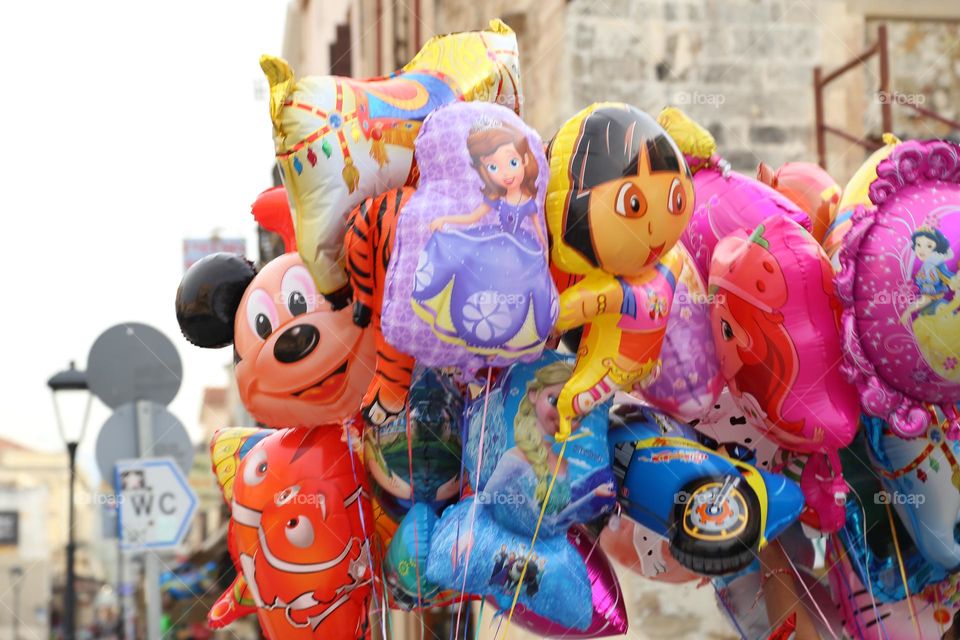 Happy faces and colorful balloons 