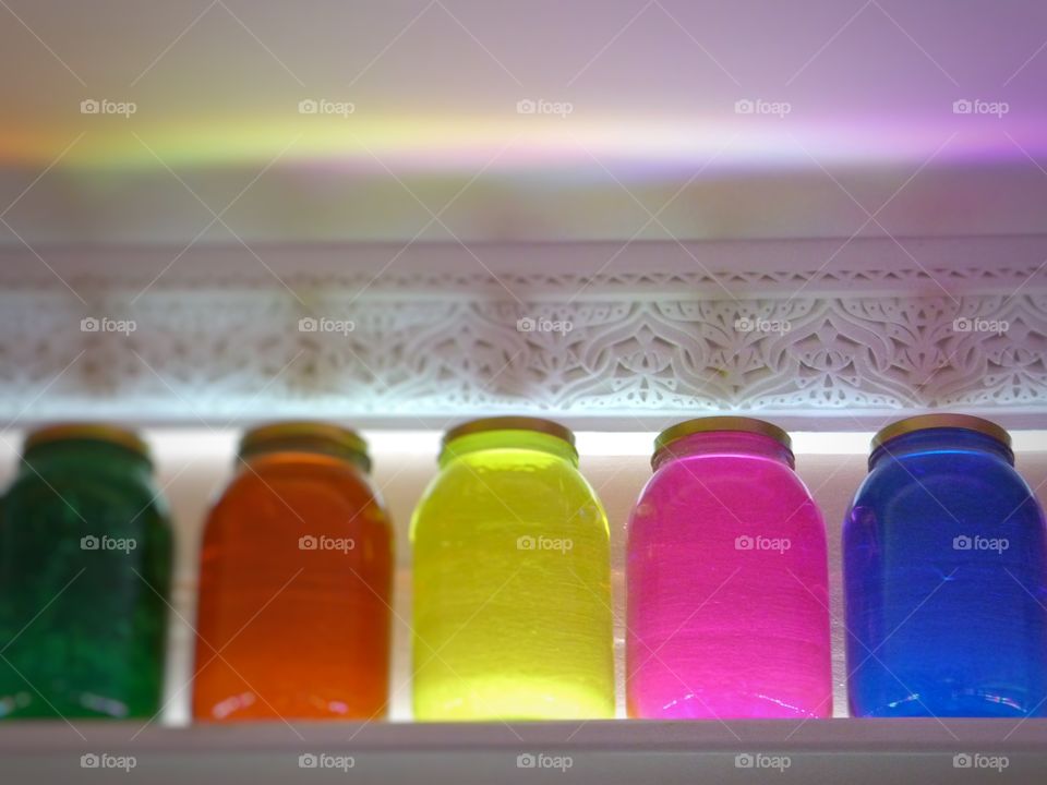 Bottles with colorful liquid in a shop in Marrakech