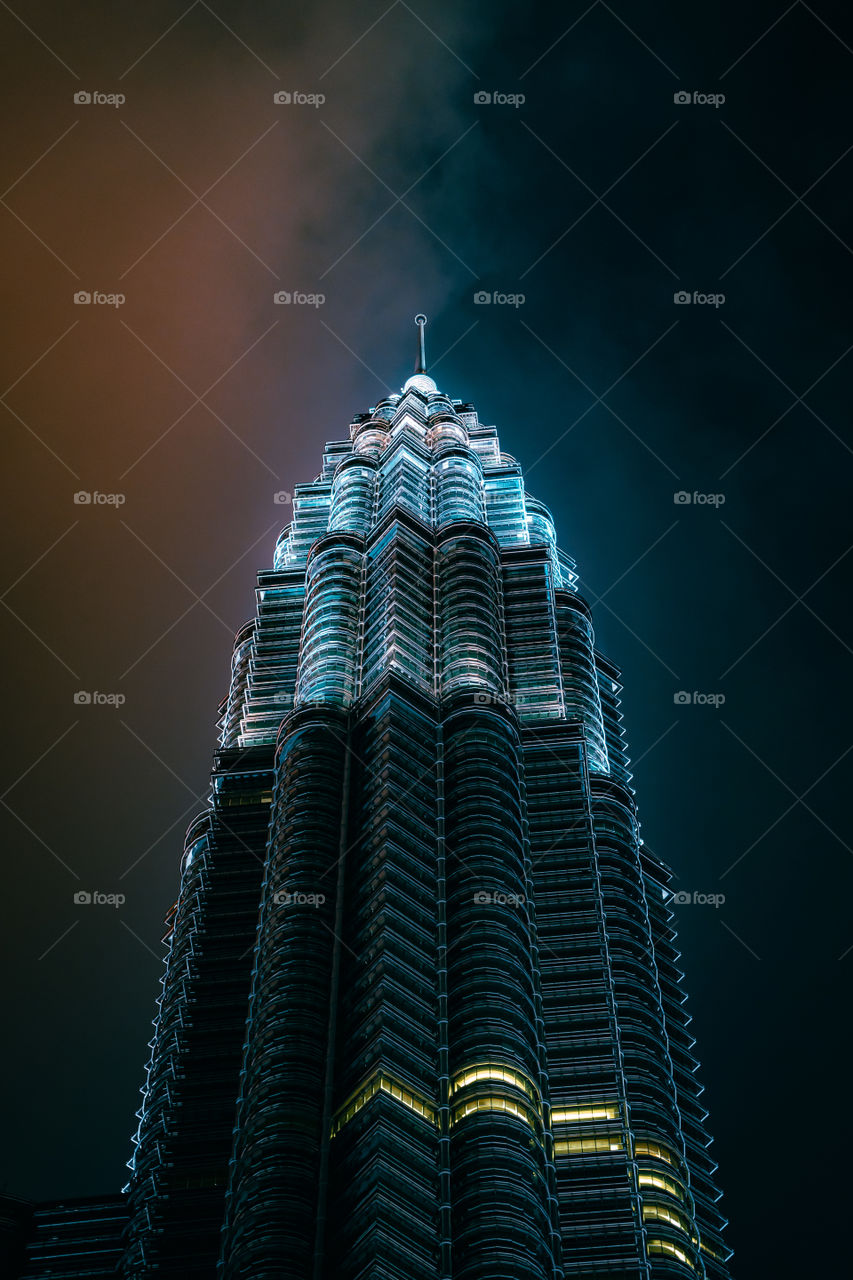 The beauty of Petronas Twin Towers. we can clearly see from details the colors blue and yellow