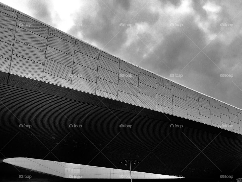 giant stadium roof in cloudy day