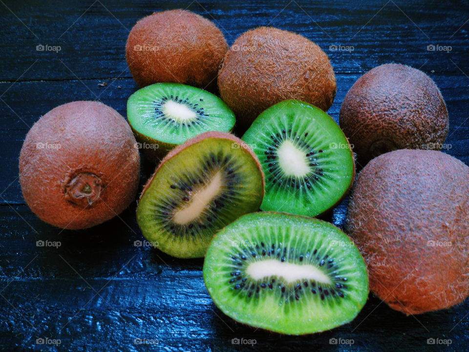 kiwi on a black background