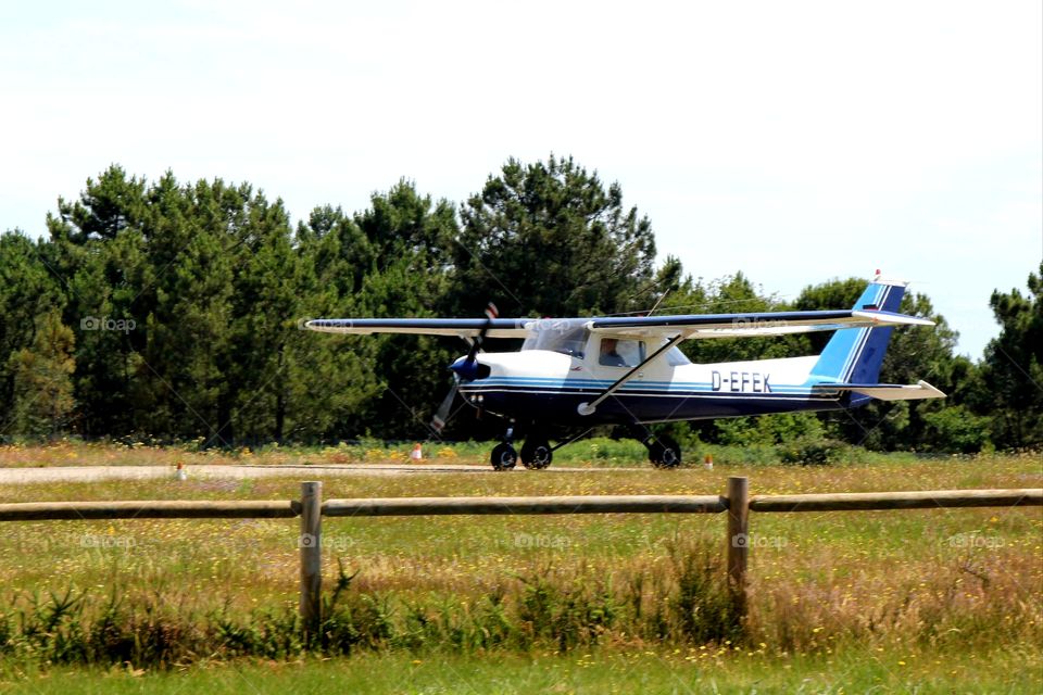 Single propeller aircraft on runway