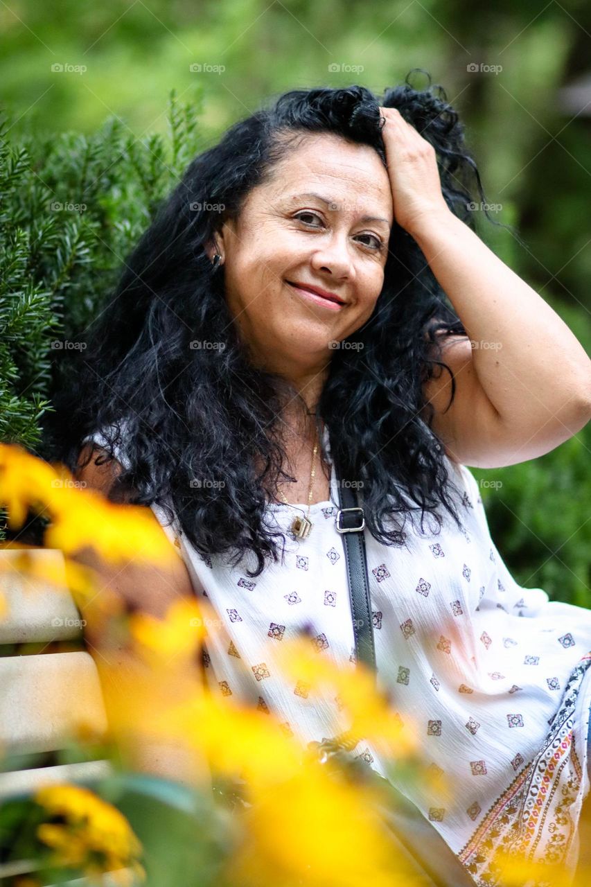 Middle-aged woman with gorgeous dark curly hair