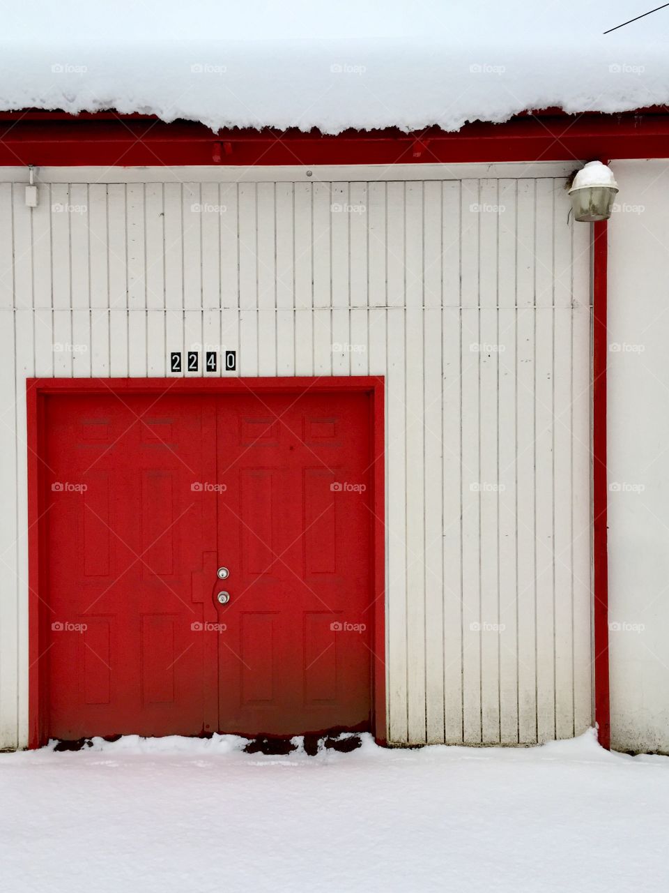 Red door in the snow