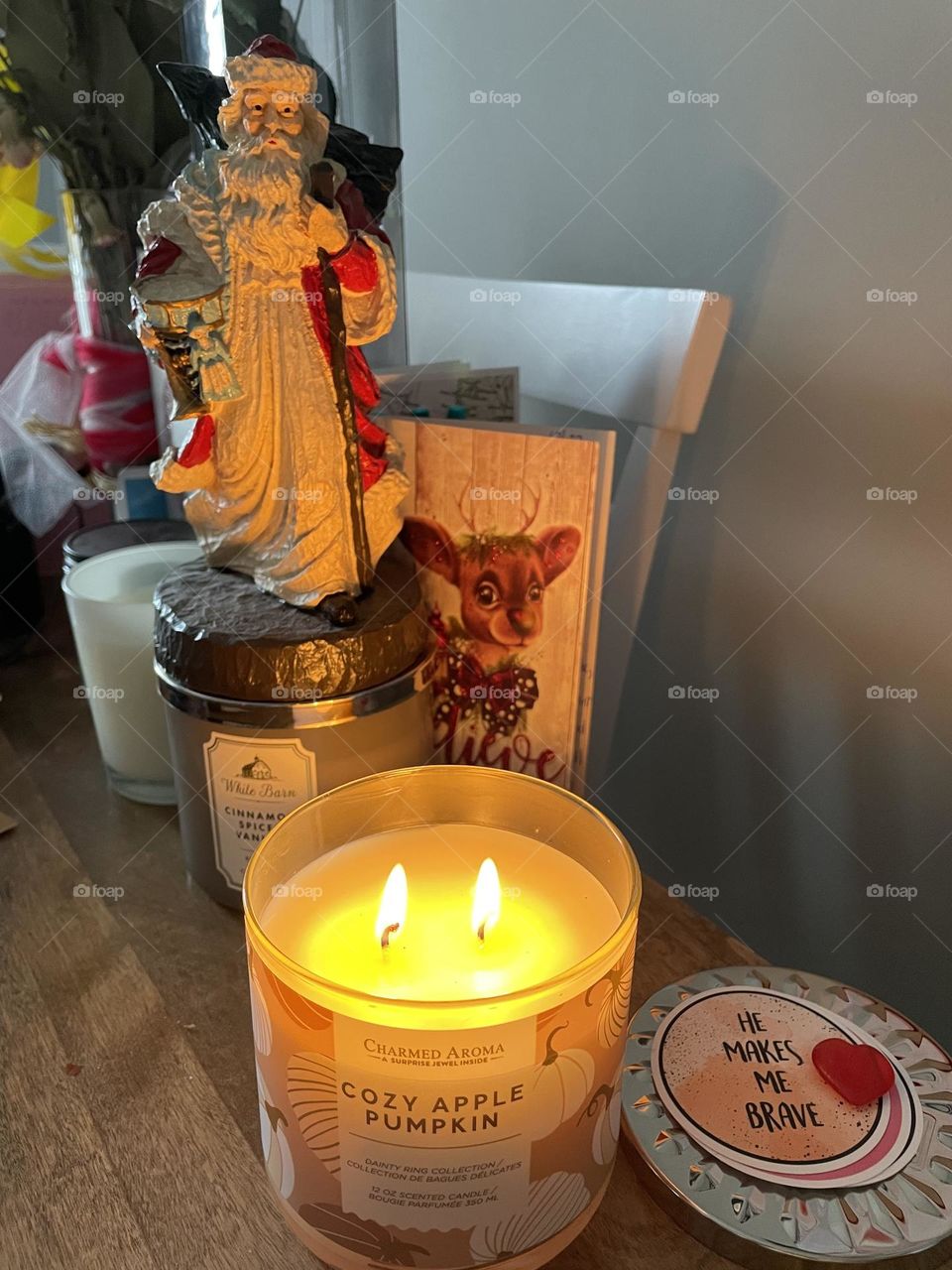 Candles always relax me, this front one is cozy apple pumpkin, with surprise ring inside, and there are 2 candles behind, as well as Father Christmas, and some stickers, with the top one saying ‘He makes me brave’