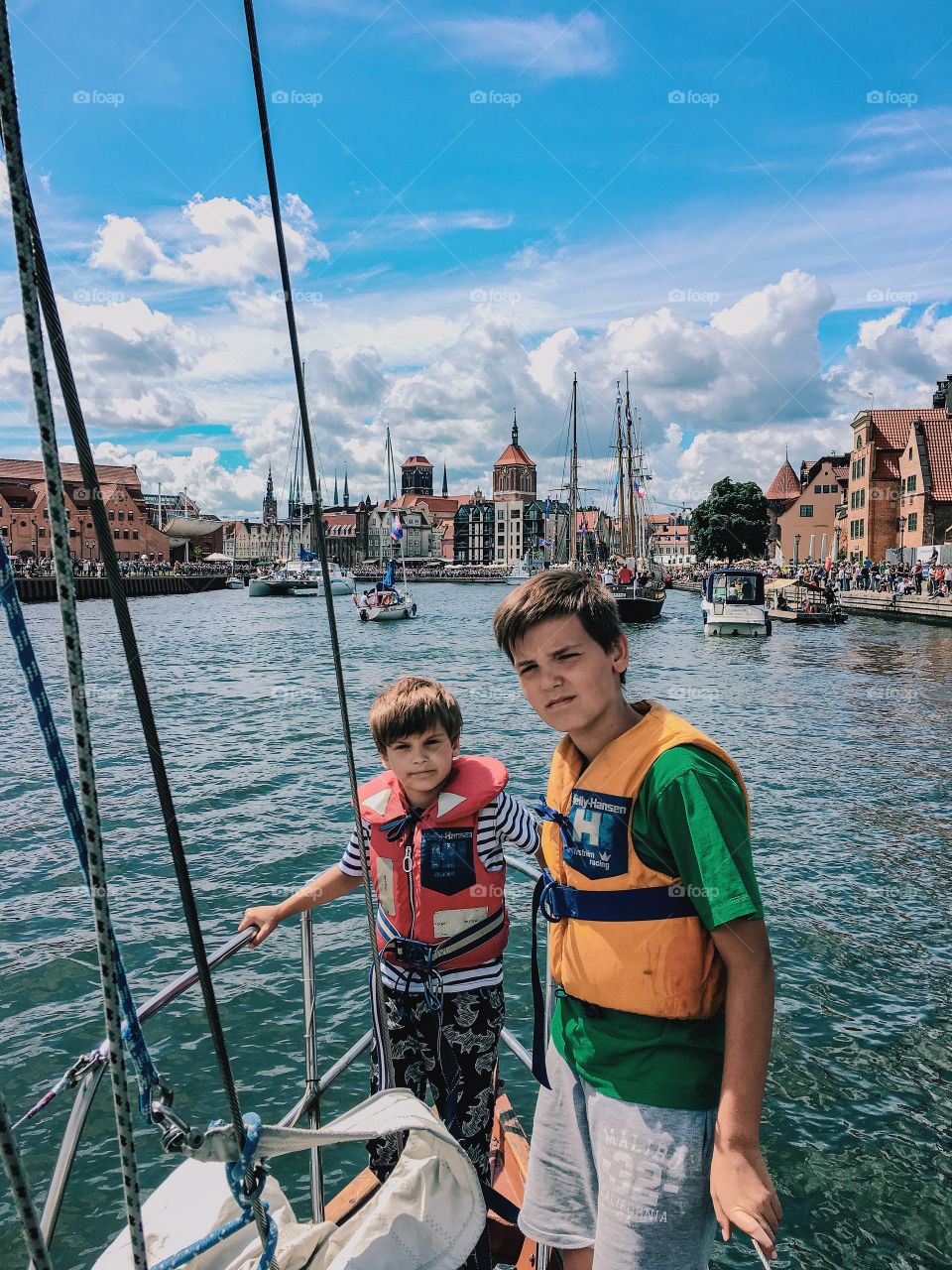 Sibling travelling in boat