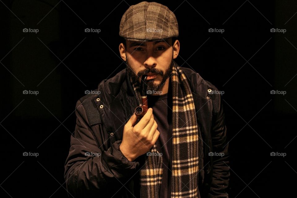 man with a smoking pipe