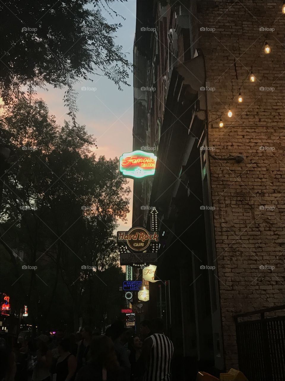 Famous Saloons neon sign Nashville TN dusk