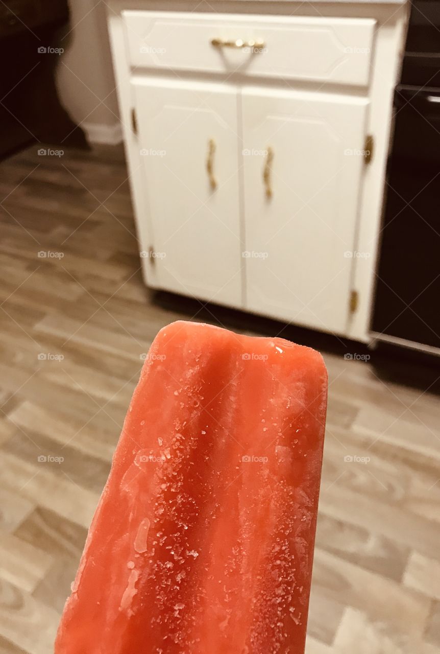 More rectangles! Cool rectangular popsicle, cabinets, and flooring found in the woods of South Georgia in this portrait photo. 