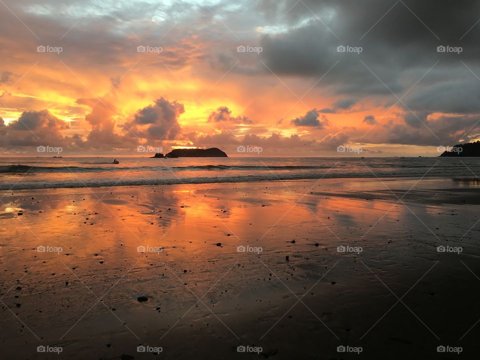 Sunset beach reflection