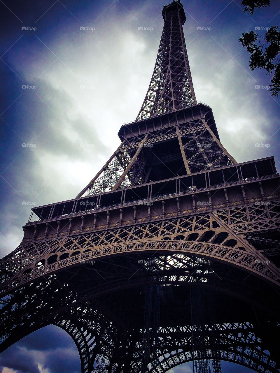 Hello there Eiffel Tower. From the base of the Eiffel Tower looking up.