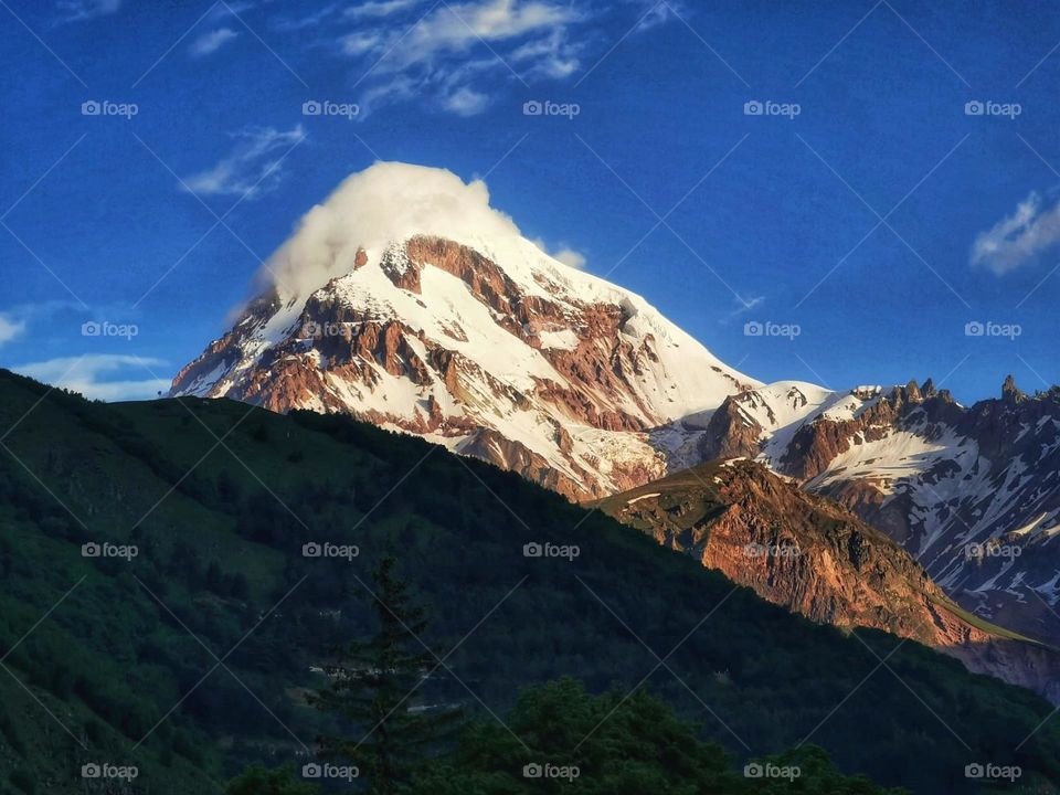 Mountain top during sunrise.