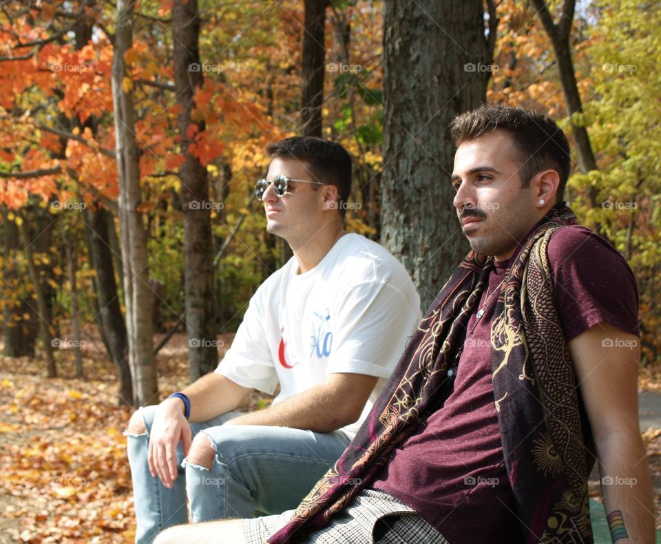 Young men sitting on a bench