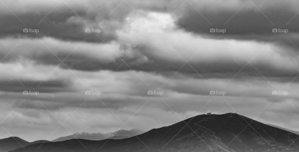Storm clouds over a mountaintop.