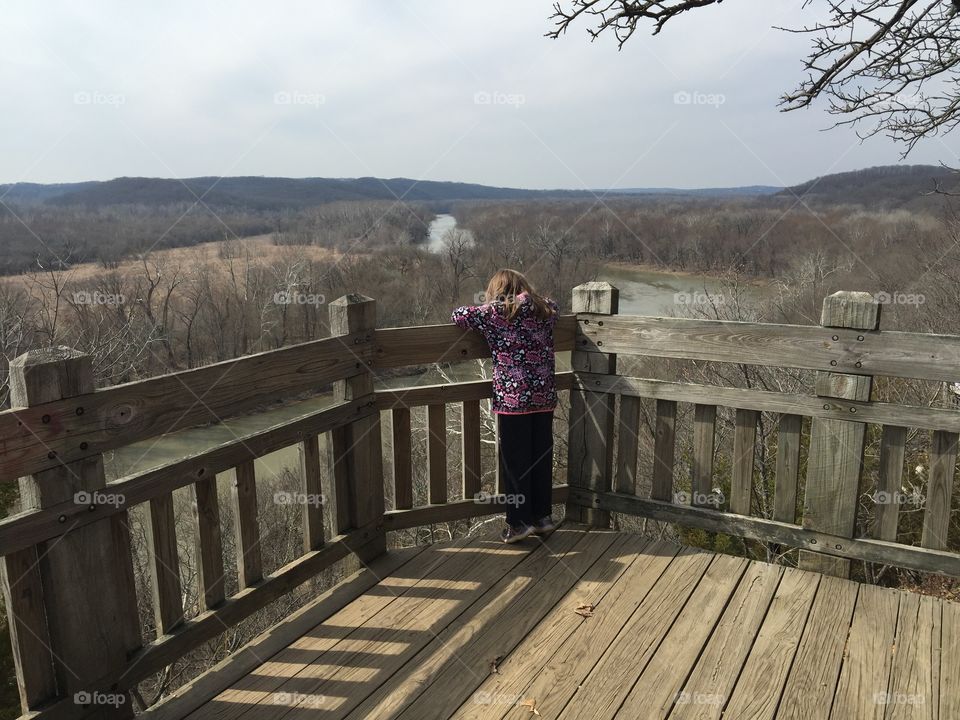 My daughter overlooking the Meramec River. This is from a lookout on a cliff above the Meramec River. 