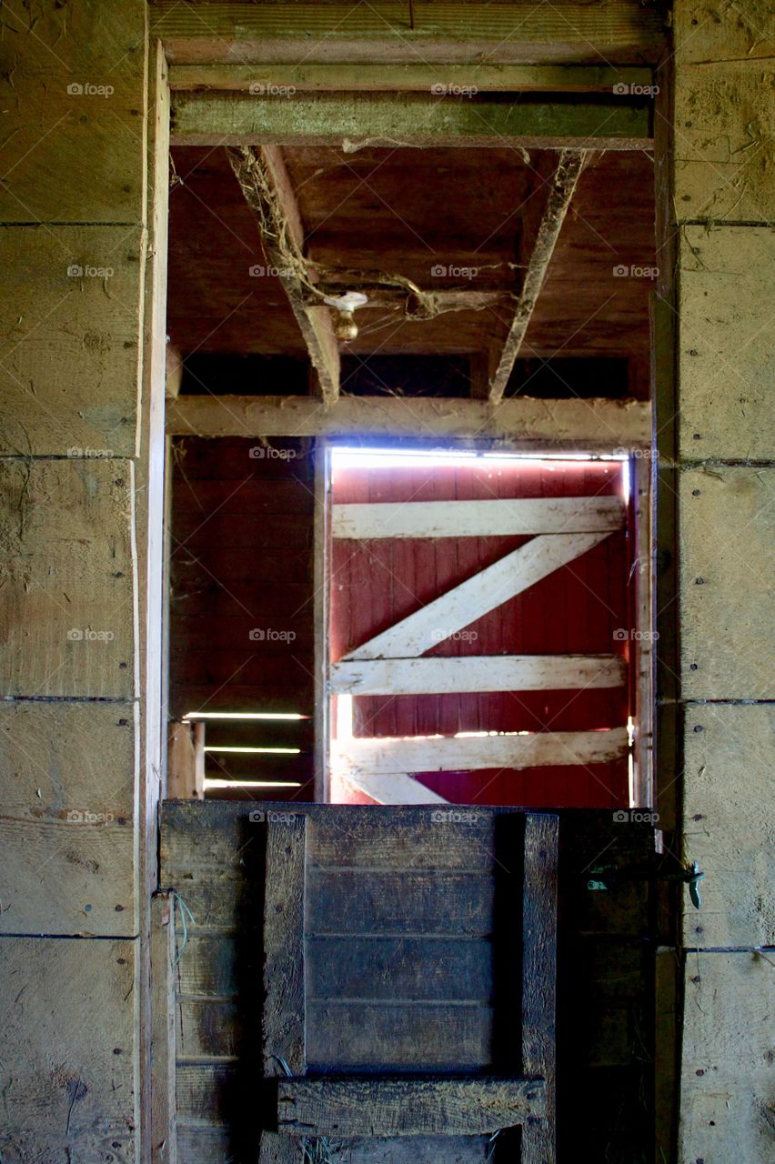 View though doors inside an old barn 