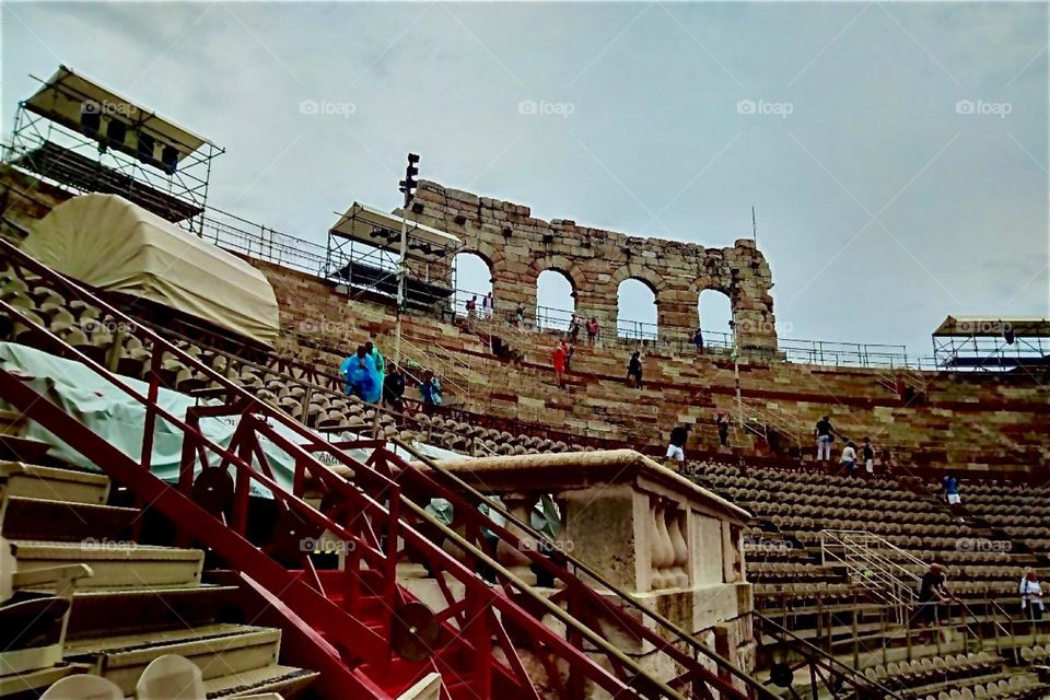 This is a relic from ages gone by and to prove that this is the place this partial ruin was left as it is. This is the arena theater in the city of „Verona“, Italy known for the tragic and true story of „Romeo & Juliette“. 2023. Hypnotic Productions