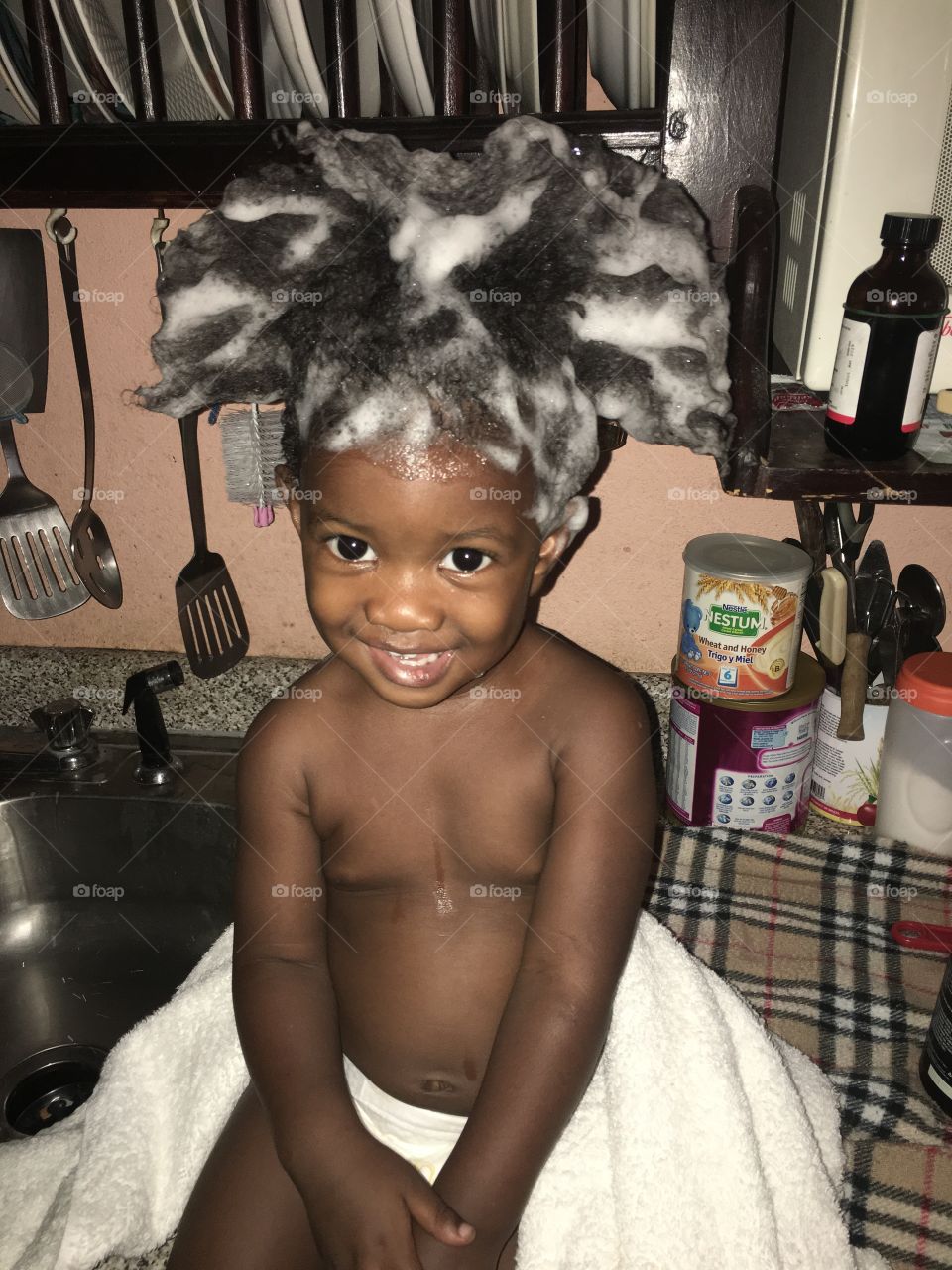 “Baby Hair Day” When my Cousin called me to snap a picture of her son. I had no ideal of the beautiful scene I was in for. I brought a smile to everyone’s face, hopefully it will bring a smile to yours as well