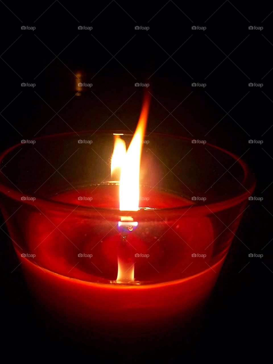 Burning red candle 