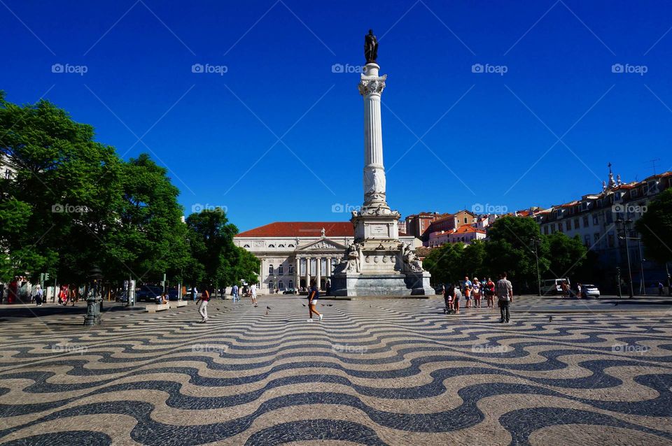 monument in the square with motley tiles