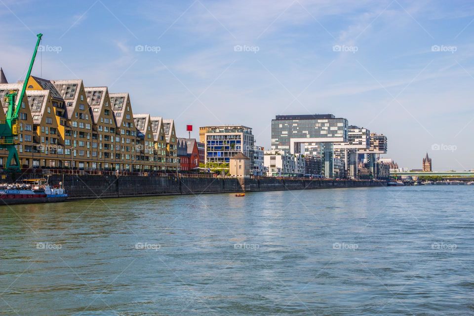 the Rhine River, the buildings and the Cityscape of Cologne or Koeln NRW Germany Europe