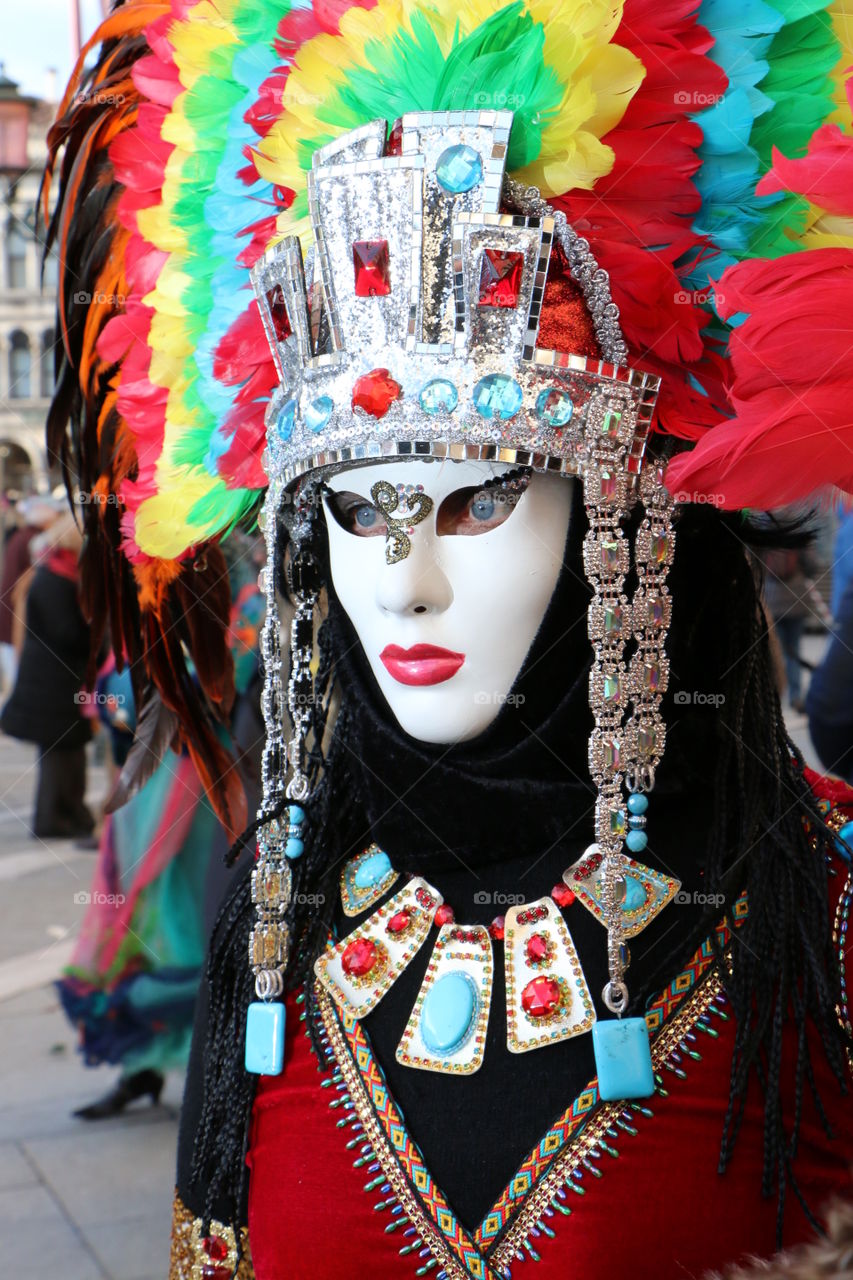 Close-up of a person wearing mask in carnival festival