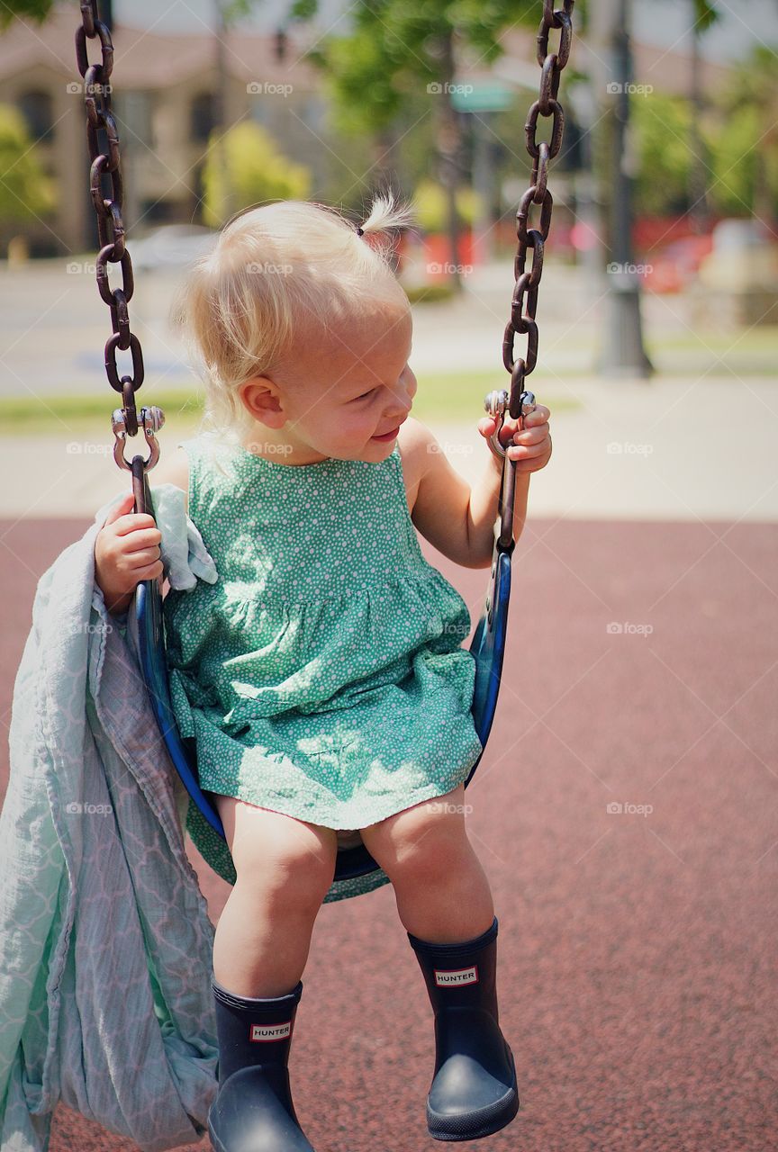 Two year old on a swing