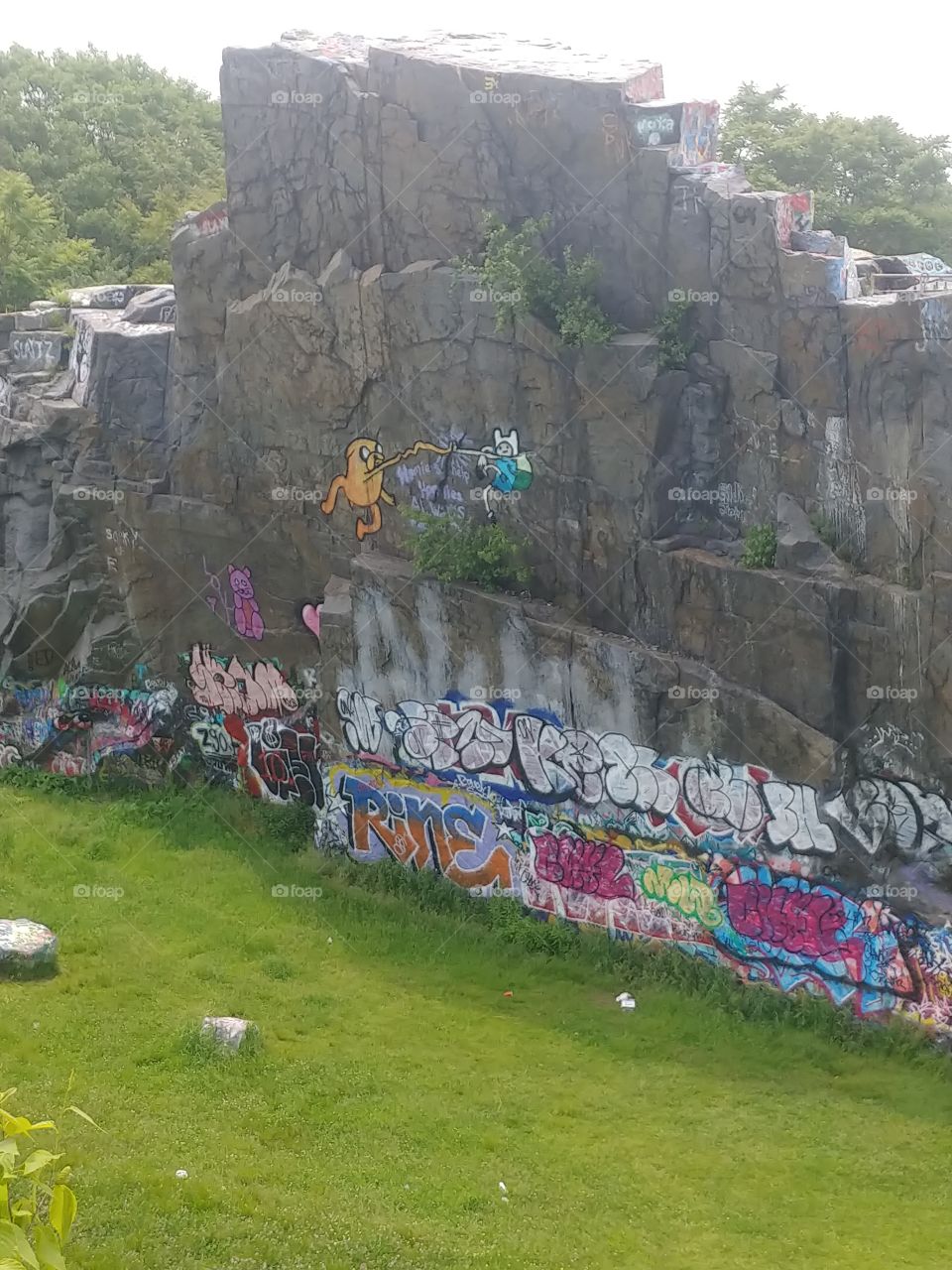 there is a lot of grafitti at the quarries where i live and it is an incredible place to go and be one with everything.