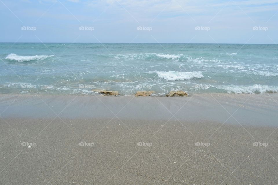 waves and rocks along the shoreline