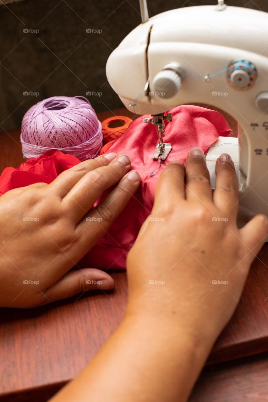 Working at the sewing machine