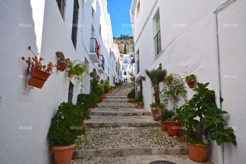 Narrow alleys in the white Spanish village of Frigiliana, Andalucia.