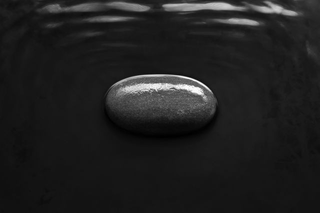 Stone in water.
