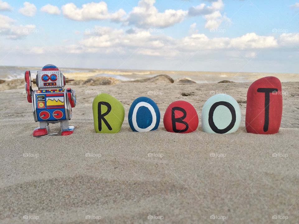 Tin robot, retro style toy with stones letters