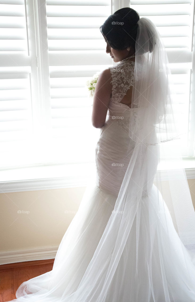 showing off the dress. Taken in Toronto, wedding day