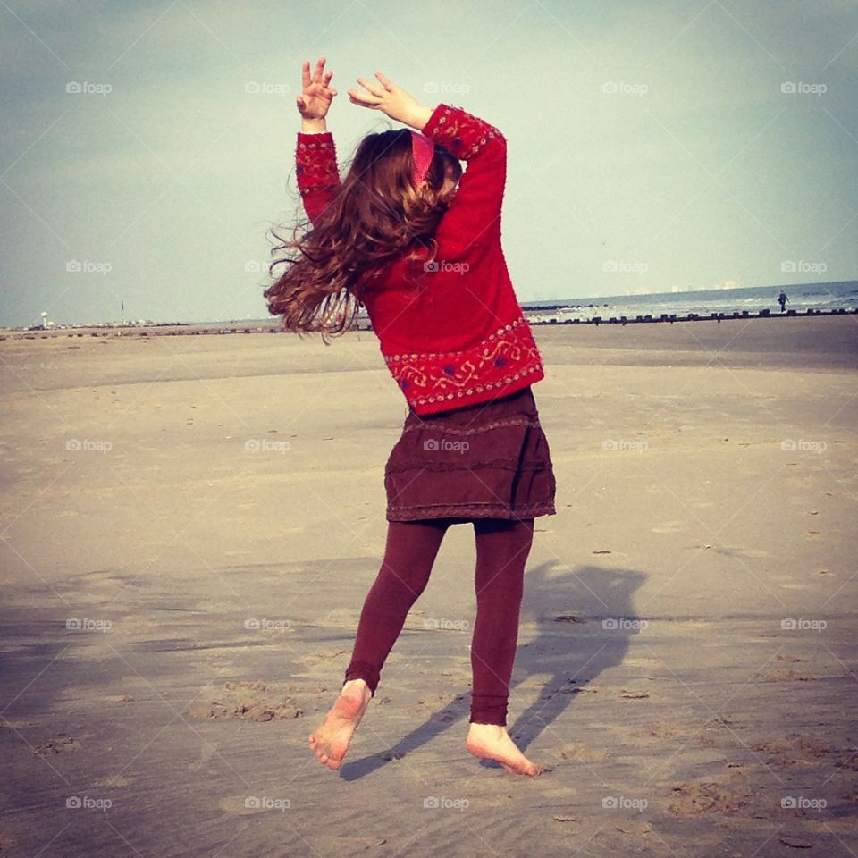Dancing on the beach . Bradin loves dancing in sand , making memories and living life to it's fullest 
