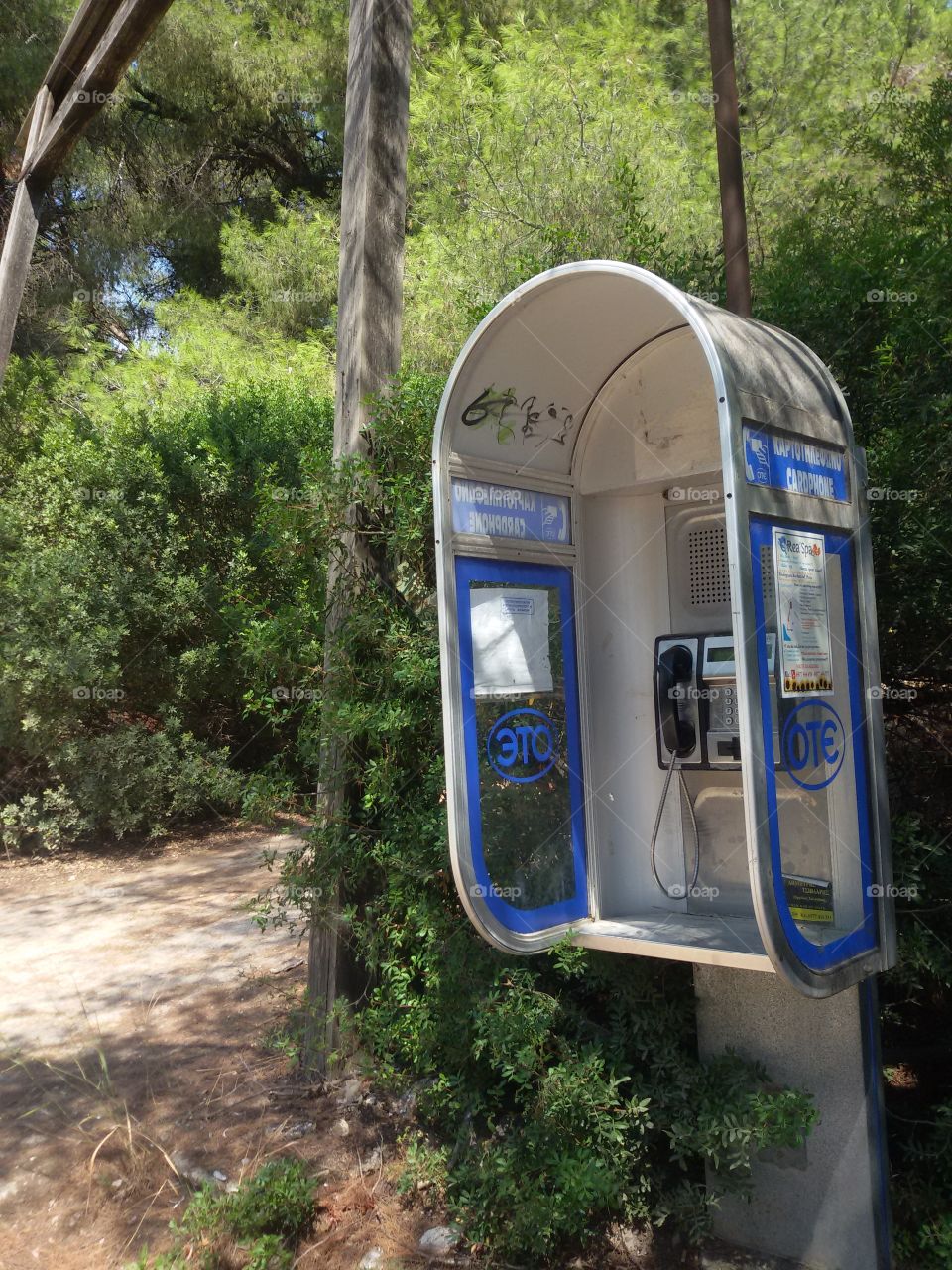 Phone booth on the beach