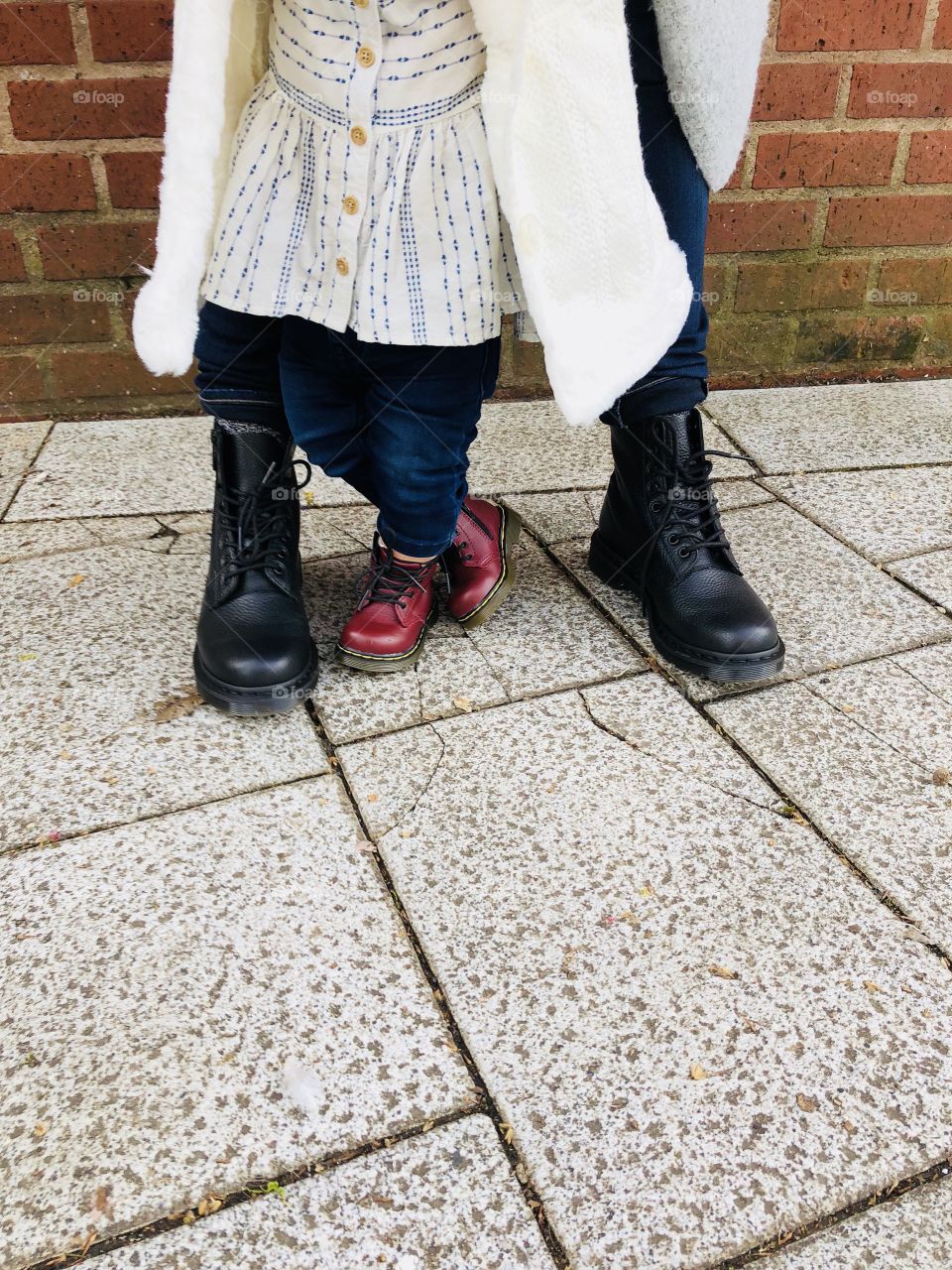 Mommy and me matching shoes. Daughter and I were stomping around downtown Portland in our docs. Love the color of her shoes against the brick wall. 