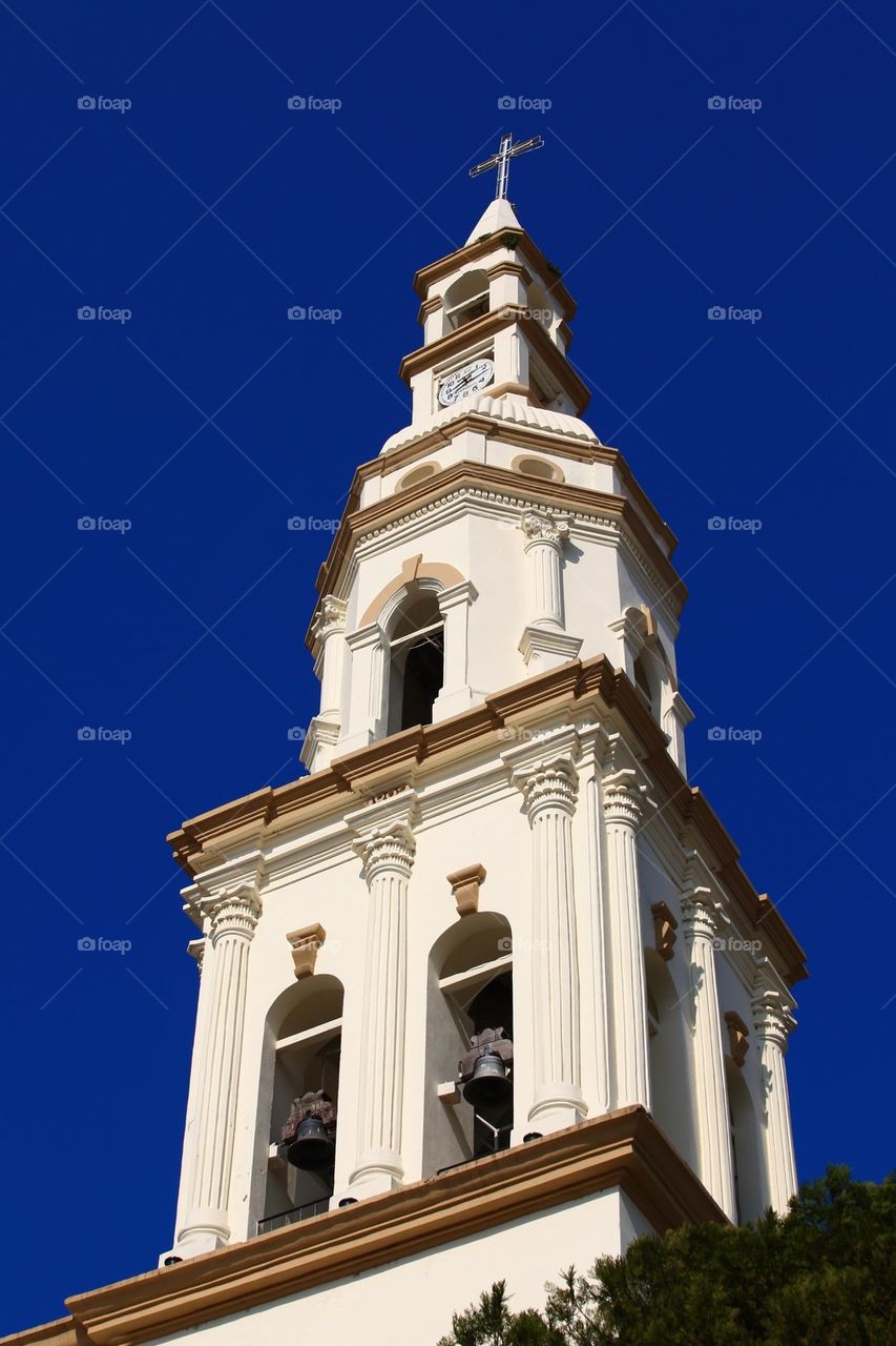 Old colonnial hispanic church belltower
