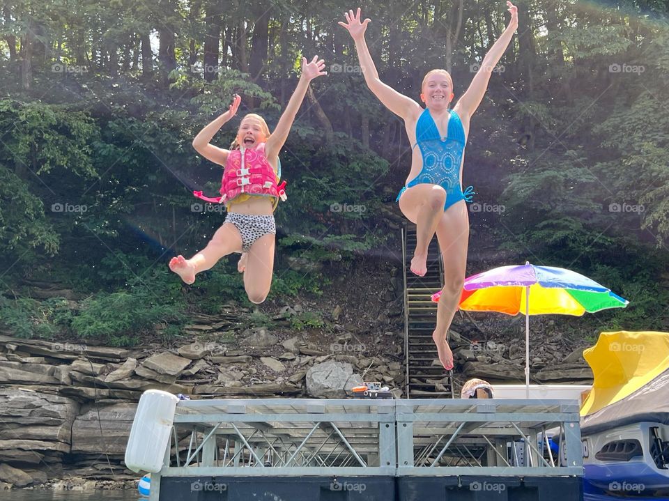 Jumping into the lake on a hot summer day 