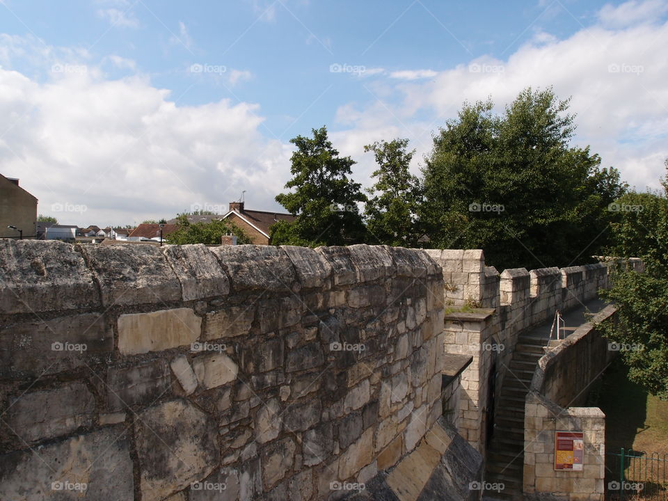 The historic fortified York Wall made of massive stone and a nice walkway surround the older parts of the city. 