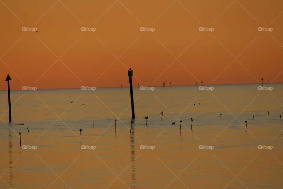 orange sunset and reflection