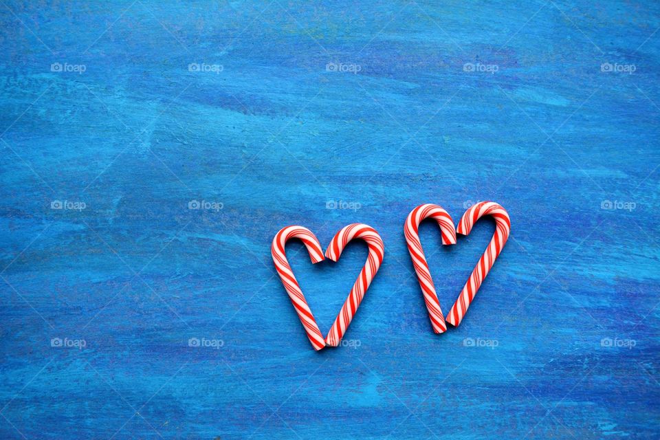 two hearts sweets blue background